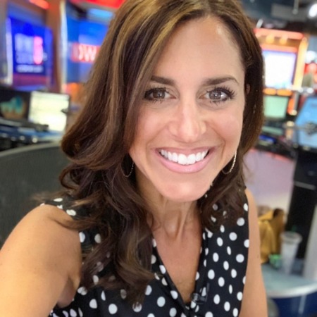 Cindy Fitzgibbon is taking a photo of herself.